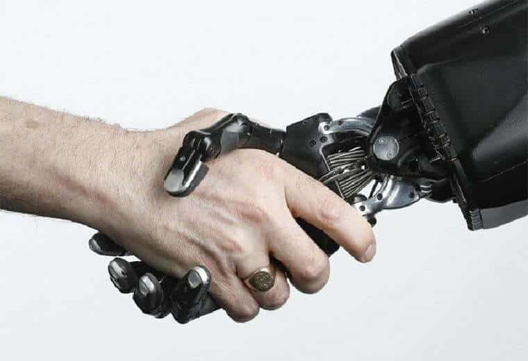 Our Story 7 a human Hand and the Shadow Robot Dexterous Hand clasping in a Handshake